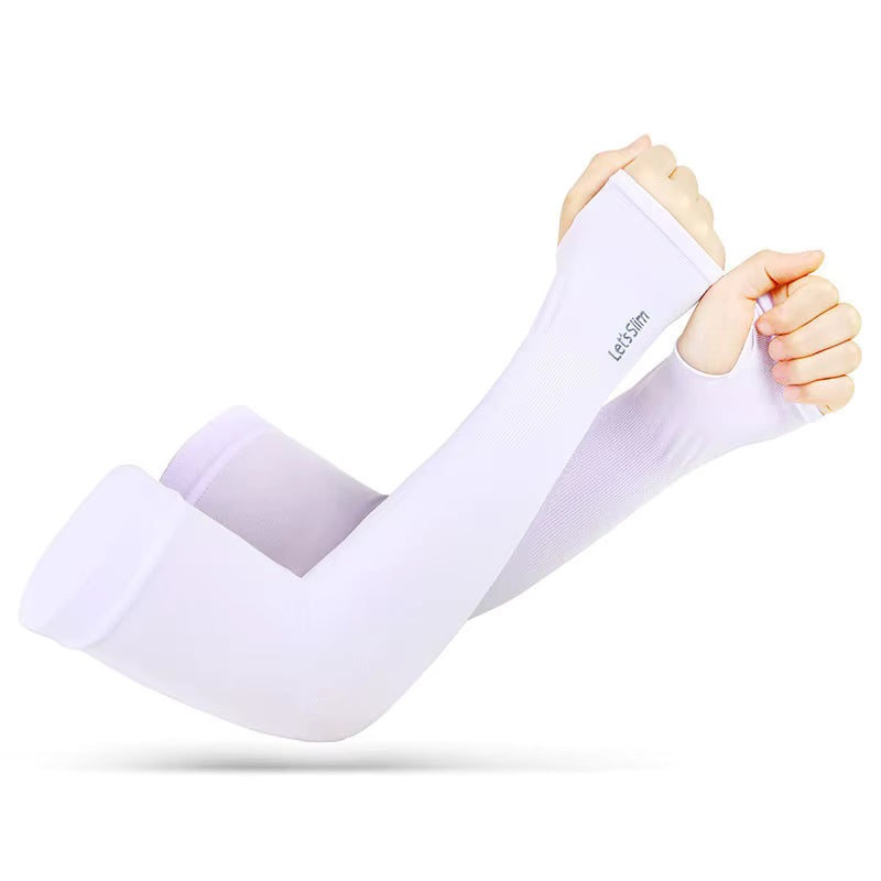 A pair of arms wearing TBNC TattooGuard SPF Sun Protection Sleeves in white, featuring fingerless design with thumb holes. These sleeves protect tattoos from UV rays and have "let's slim" printed on one sleeve.