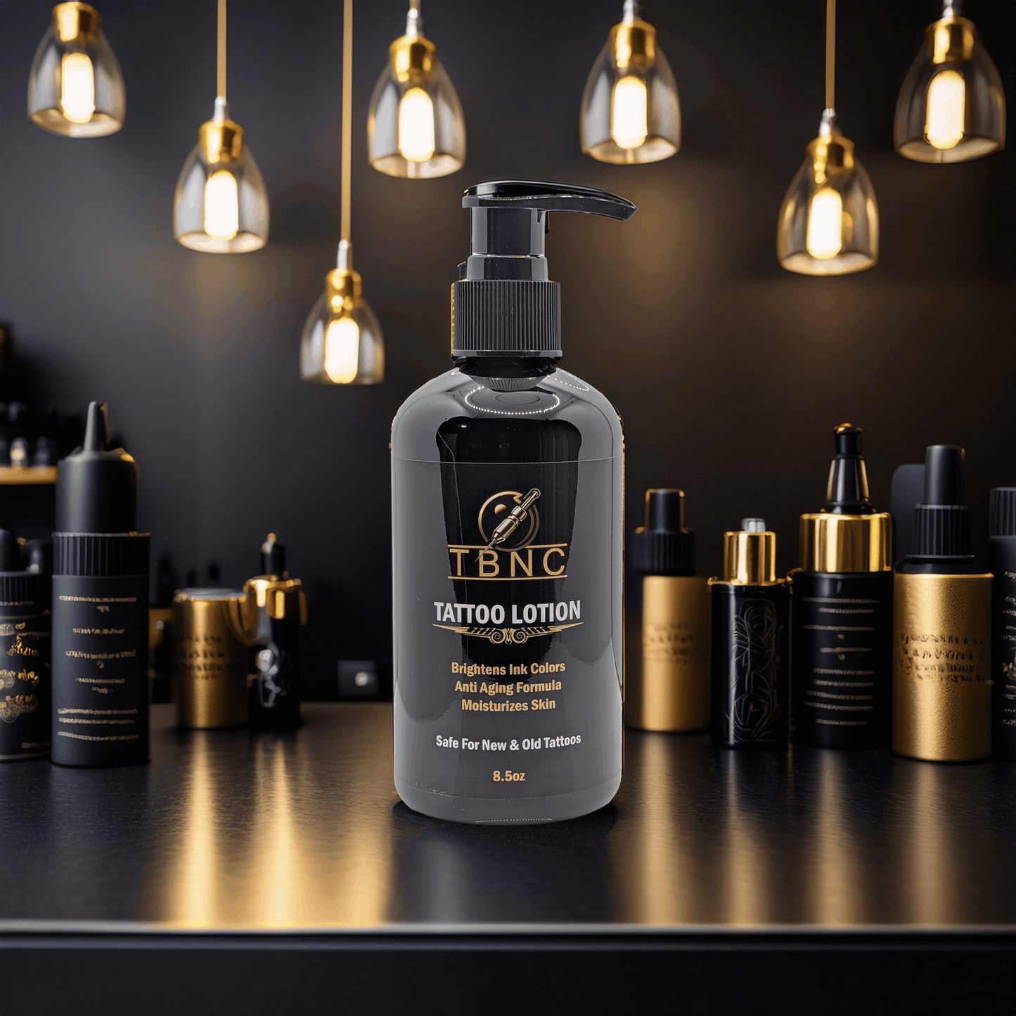 A bottle of TBNC - The Best Numbing Cream Tattoo Lotion - Peppermint, designed to enhance tattoo vibrancy, rests on a dark counter among sleek black and gold bottles, with modern pendant lights and elegant shelving behind.