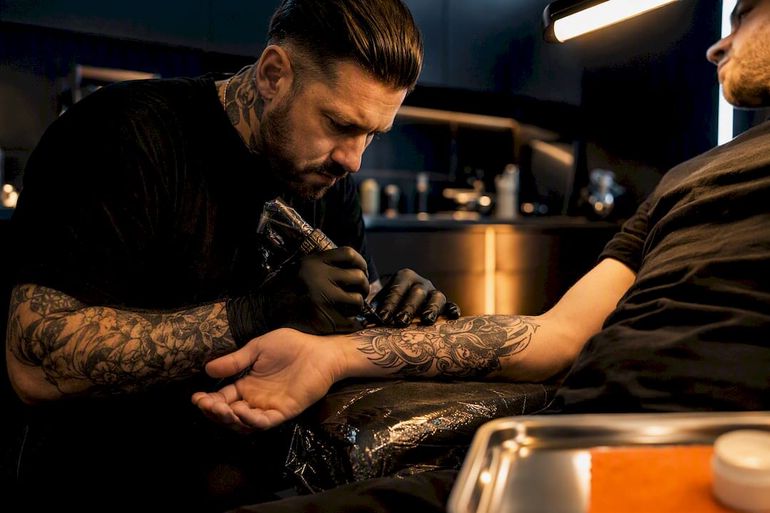 Relaxed client during tattoo session