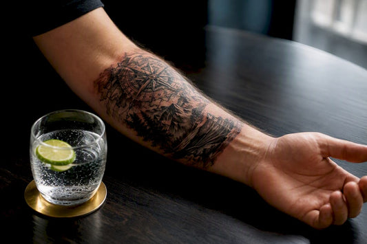 Fresh tattoo beside sparkling water