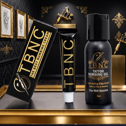Best-selling TBNC Numbing Bundle—premium cream and gel—displayed with tattoo essentials in a luxe black-and-gold setting.