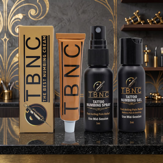 Top-selling tattoo numbing bundle products are showcased on a black marble counter with a luxurious gold and black backdrop.