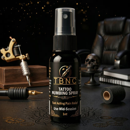TBNC Tattoo Numbing Spray bottle with tattoo equipment in the background