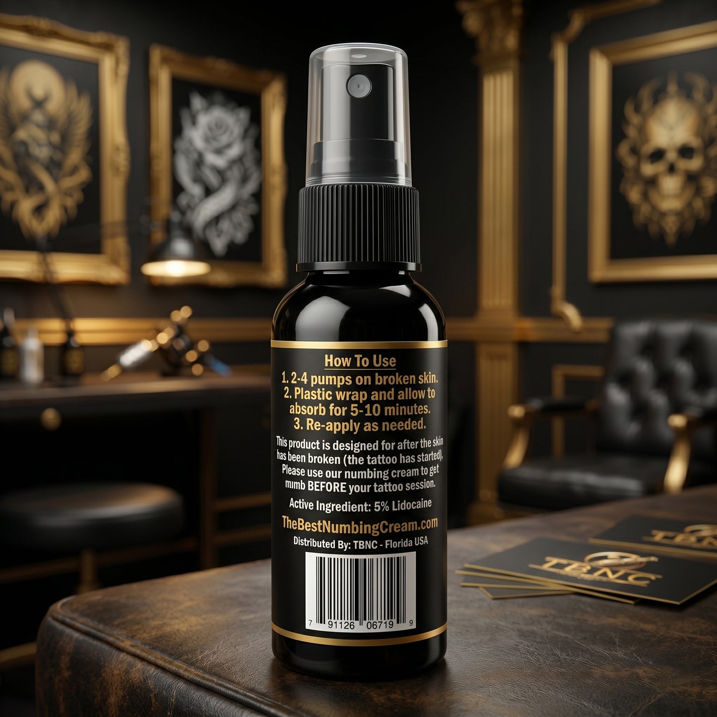 A top-selling TBNC Tattoo Numbing Spray sits on a stylish gold-accented desk, with bold directions and tattoo art in view.