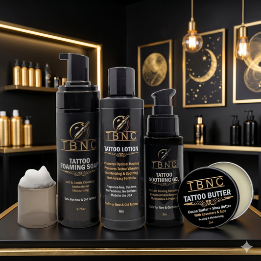 Our top-rated Tattoo Aftercare Bundle—numbing cream, soap, lotion, gel & butter—displayed in a luxe black and gold setting.
