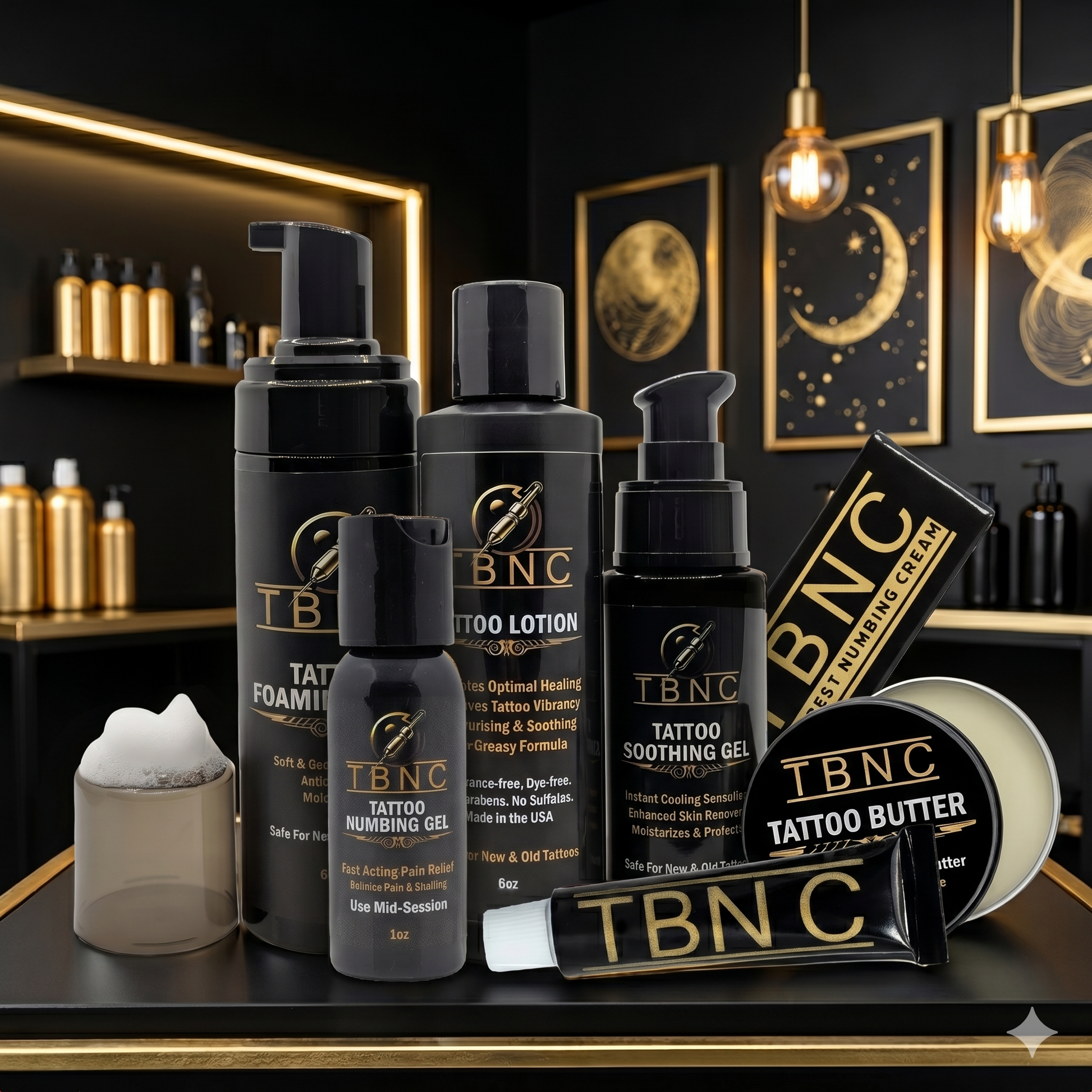 Top-selling TBNC Tattoo Numbing & Aftercare Bundle showcased on a table in a sleek black-and-gold room with art and shelving.