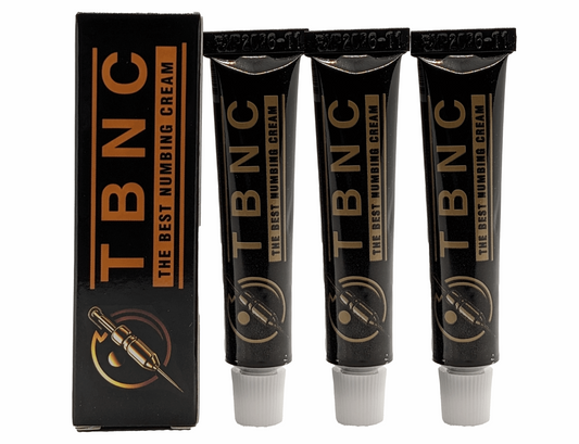 Three black tubes of TBNC's "The Best Numbing Cream - TBNC - 3 Pack" with "The Best Numbing Cream" written below are standing next to a matching black box featuring the same text and a needle graphic on the side. The caps of the tubes are white, making them perfect for ensuring painless tattoos.