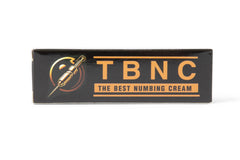 A black box with a logo featuring a stylized syringe and the text "TBNC - The Best Numbing Cream" in vibrant orange lettering, ideal for painless tattoos, available in a convenient 2 pack.