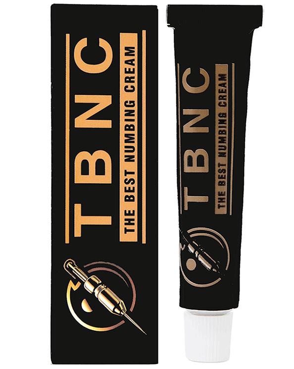 A black tube labeled "The Best Numbing Cream - TBNC" sits next to its matching box, which displays the same text and an image of a syringe. Designed for painless tattoos, the sleek box and tube feature gold and silver accents, highlighting the cream's advanced numbing properties.